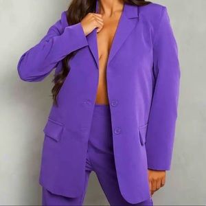 Purple Blazer. Never been worn Brand new with tags.